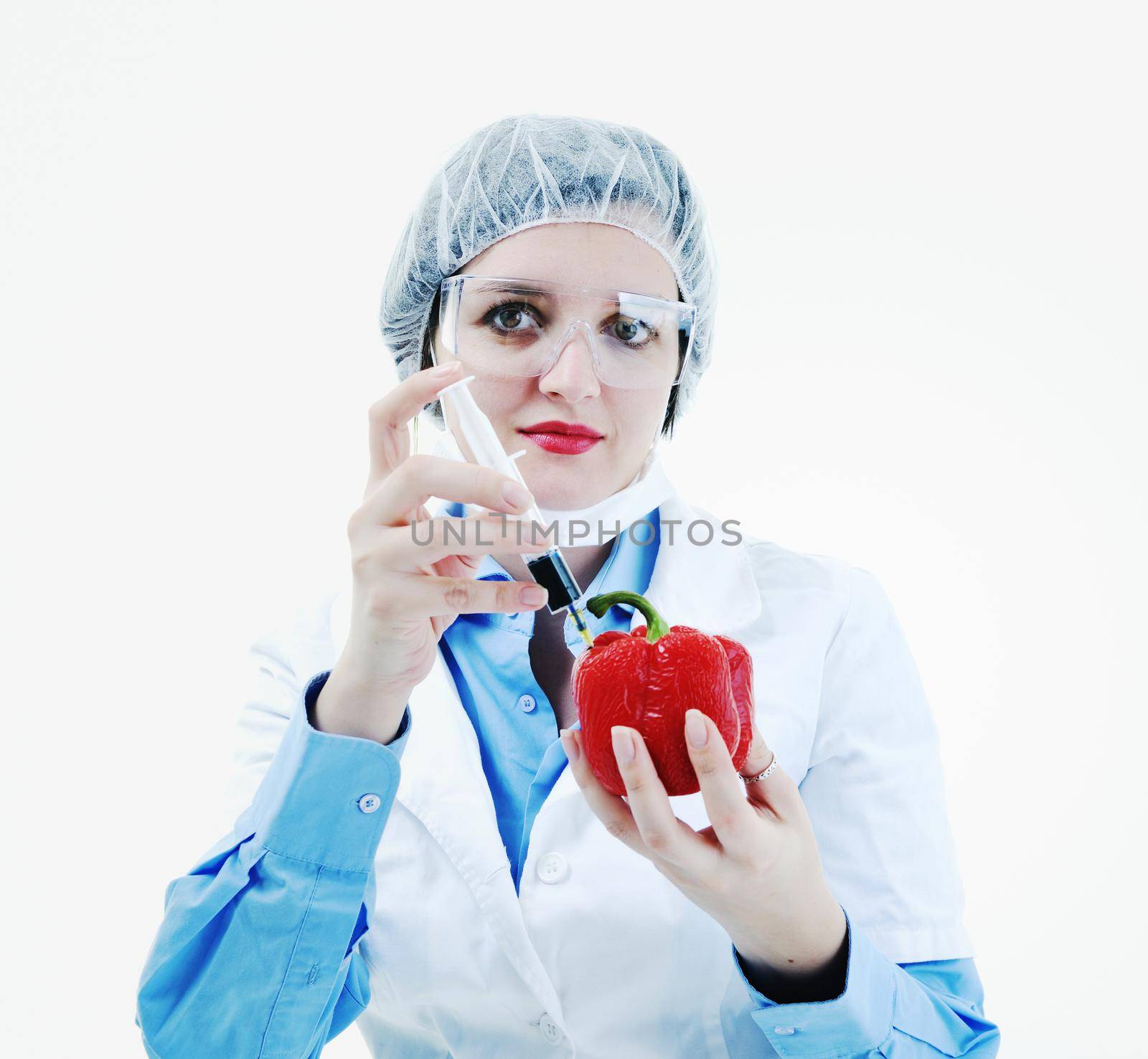 isolated on white young nurse doctor woman with red vegetable food papper representing bio food concept 