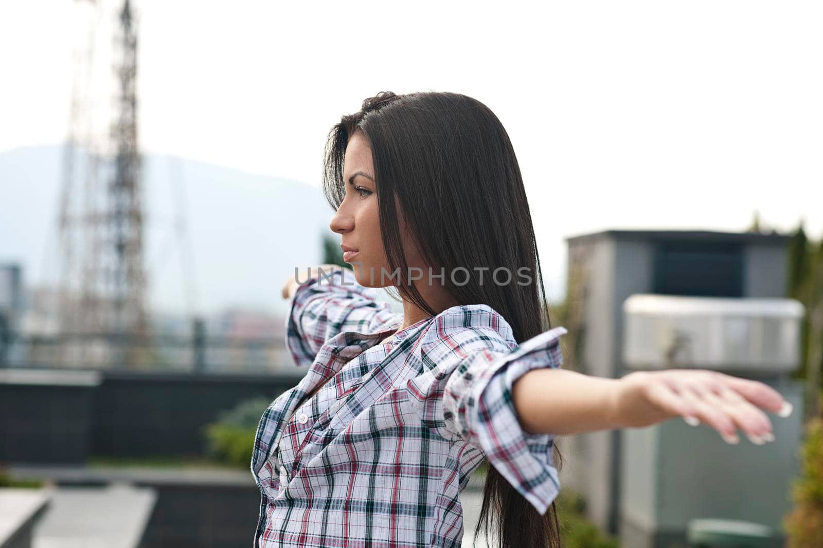 beautiful young woman lady posing in green moden outdoor garden