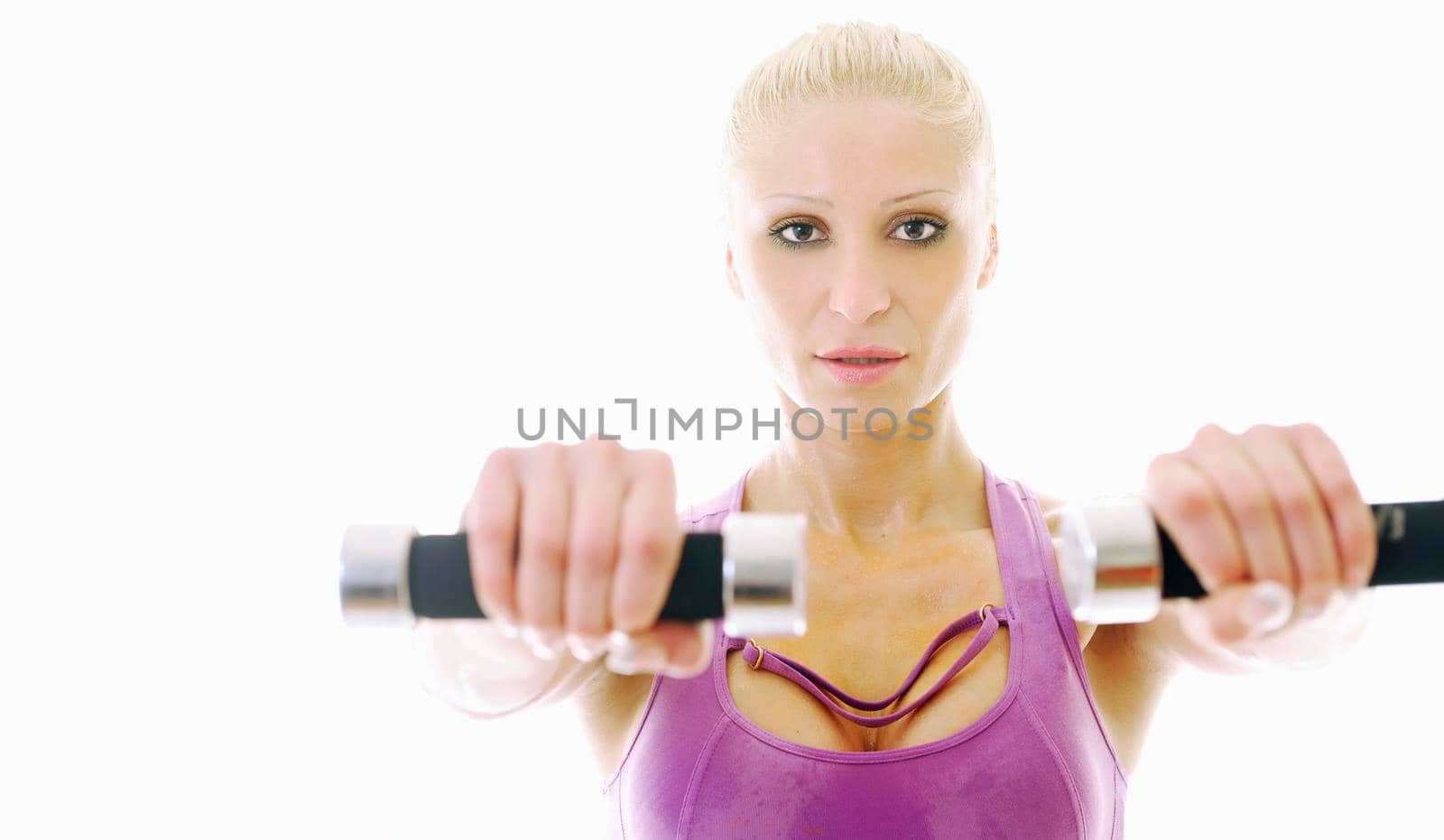 young beautiful woman exercise fitness pose isolated on white in studio