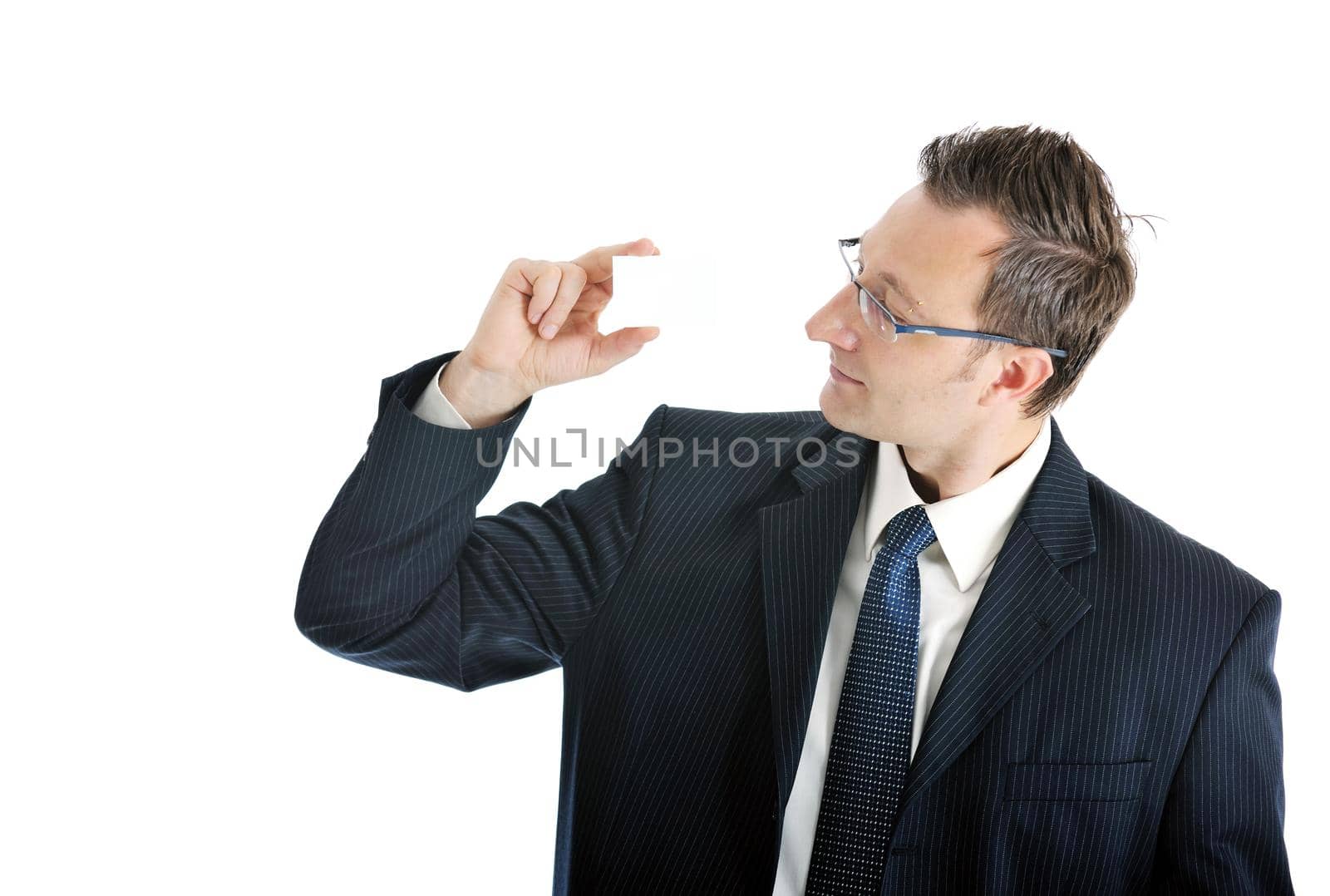 portrait of young businessman with empty business card isolated on white background 