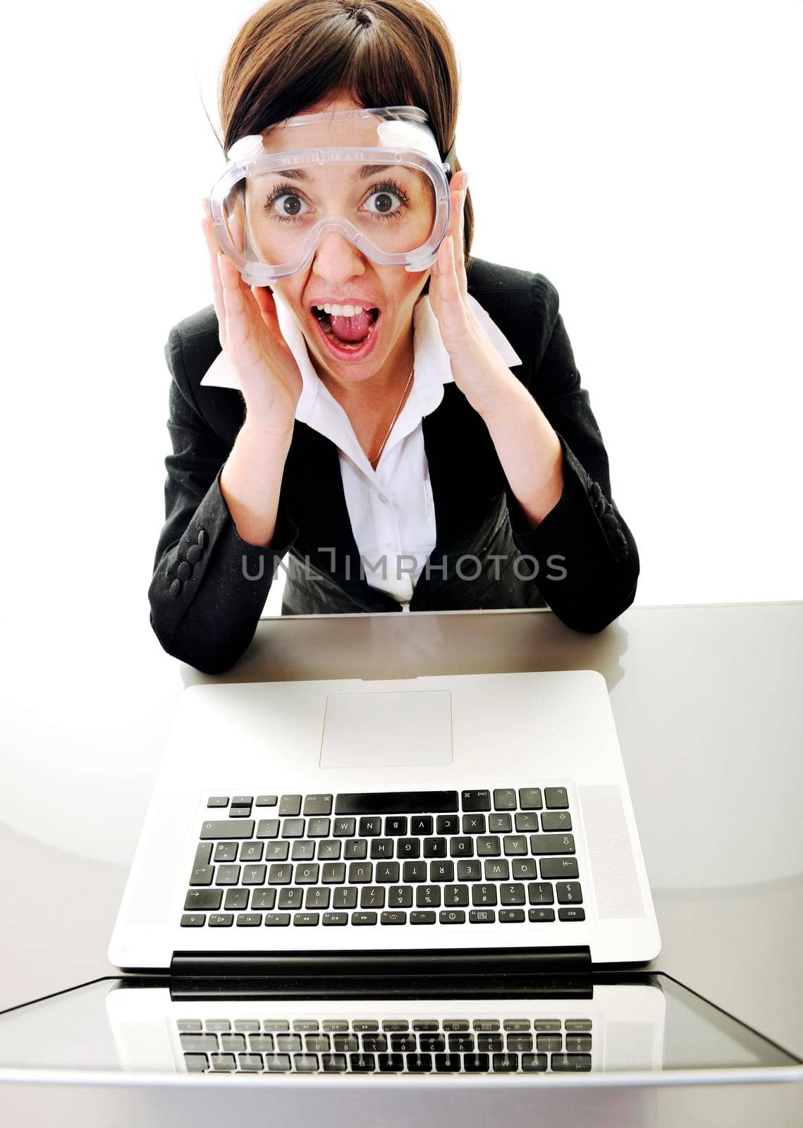 one young business woman isolated on white working on laptop computer