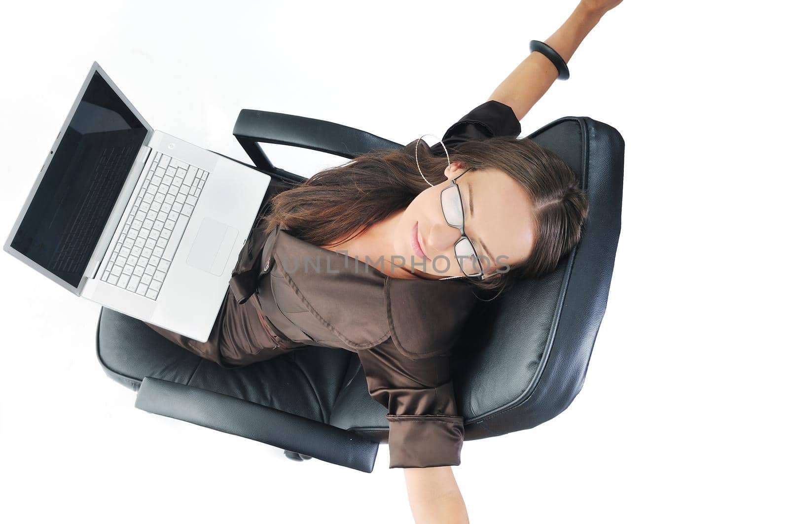 young beautiful business woman isolated on white workling on laptop computer