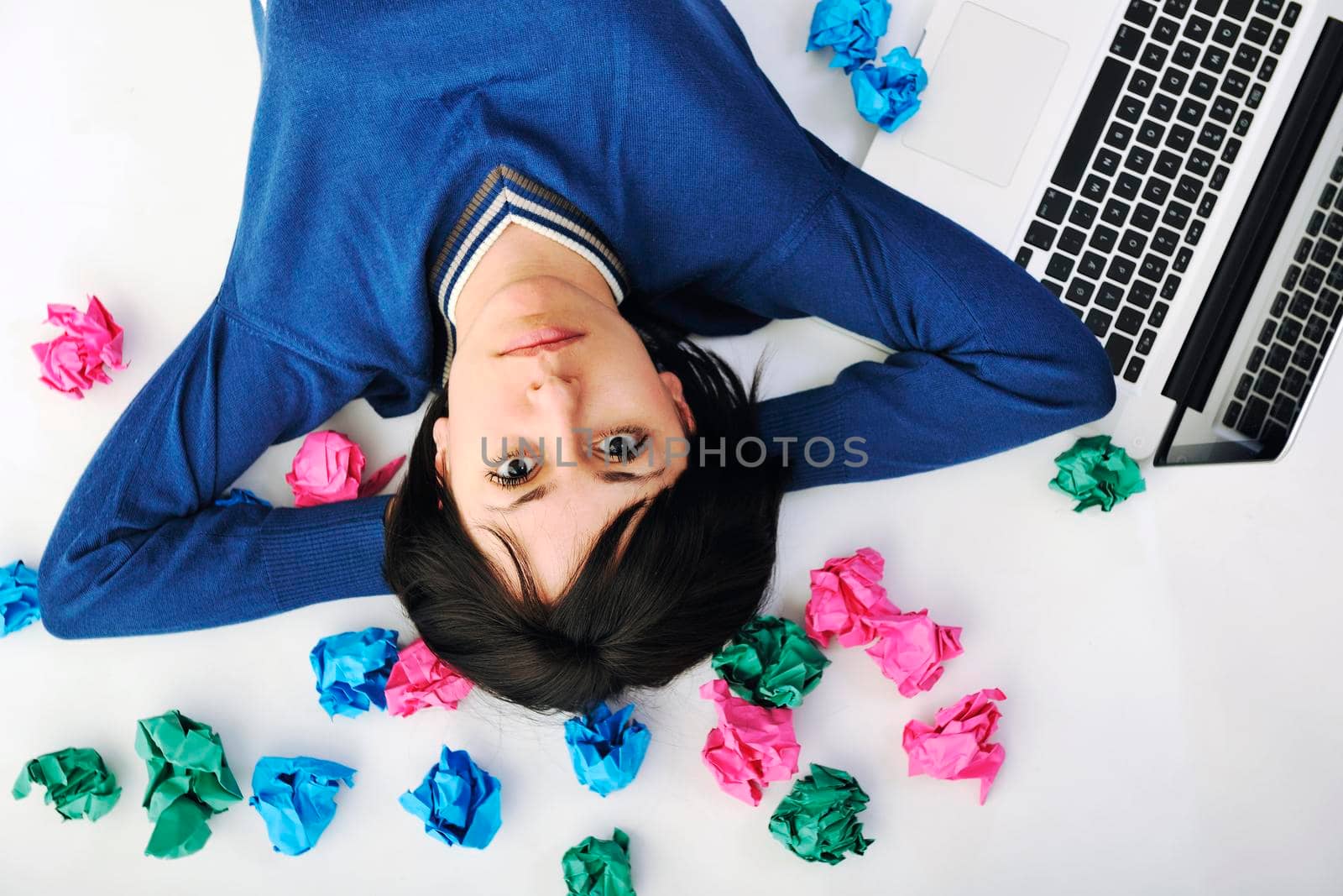 young beautiful brunette student woman working on laptop computer and finding solutions