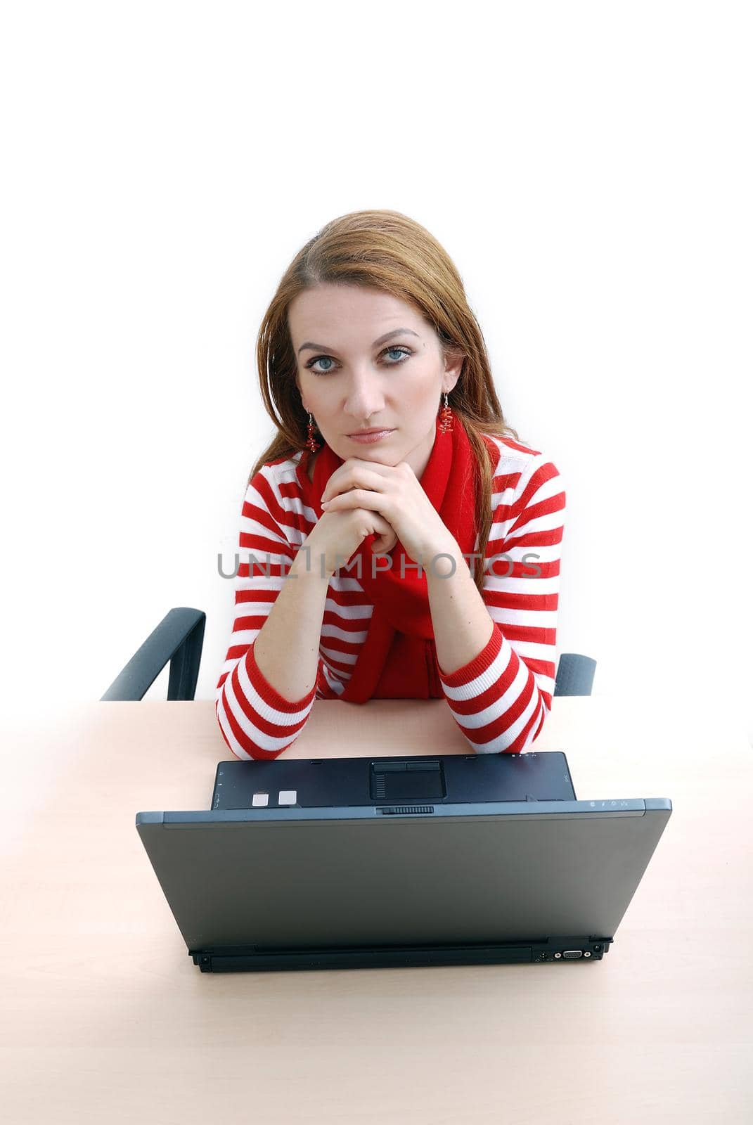 woman in red working on laptop at bright  office