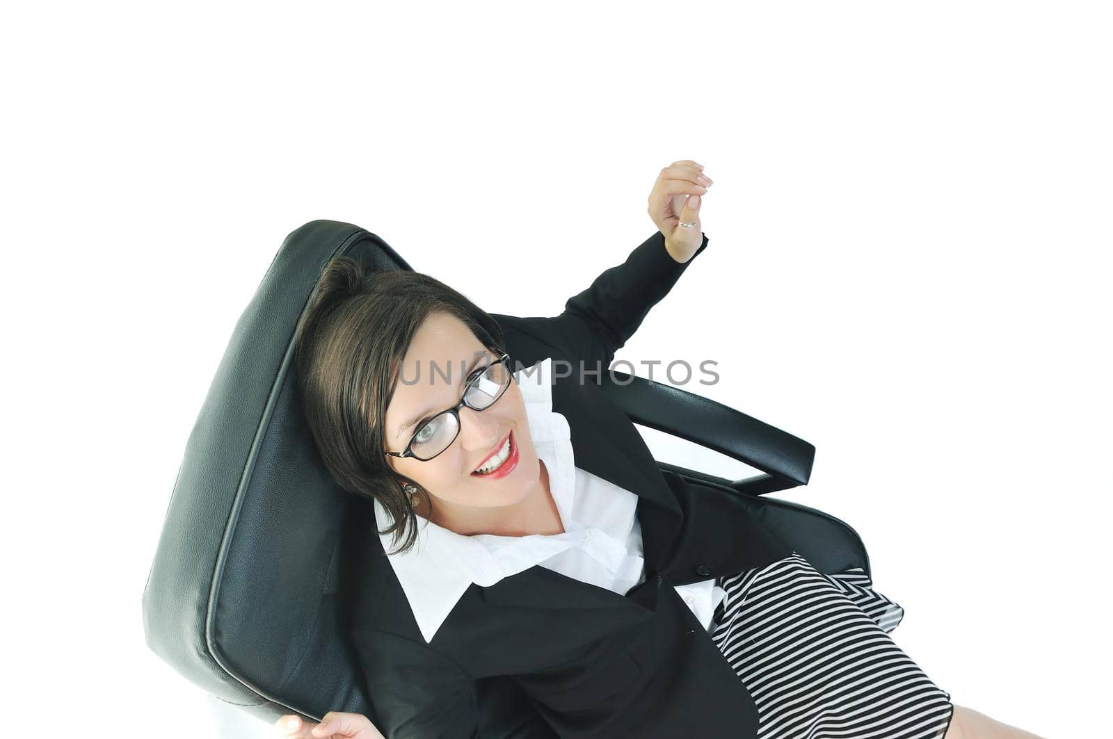 young beautiful business woman isolated on white workling on laptop computer