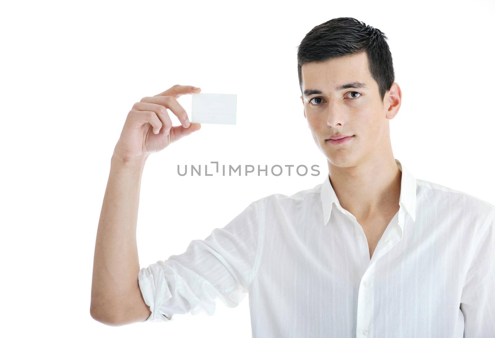 portrait of young businessman with empty business card isolated on white background 