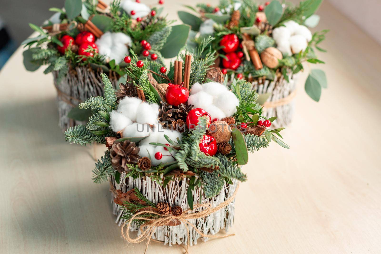 Christmas decoration with carnations, chrysanthemums santini, brunia and fir. Christmas spirit and mood