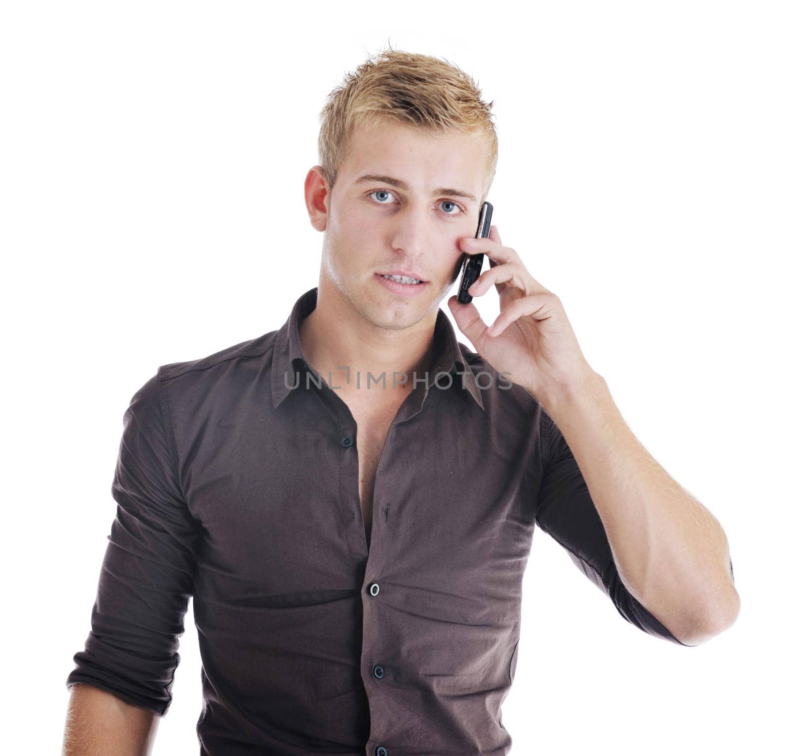 young handsome businessman with cellphone isolated on white