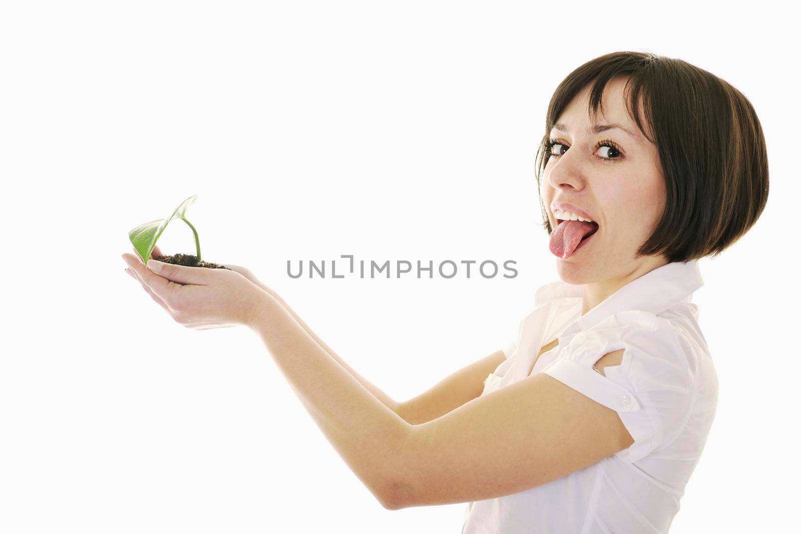 young business woman isolated on white holding green plant with small leaf and waiting to grow