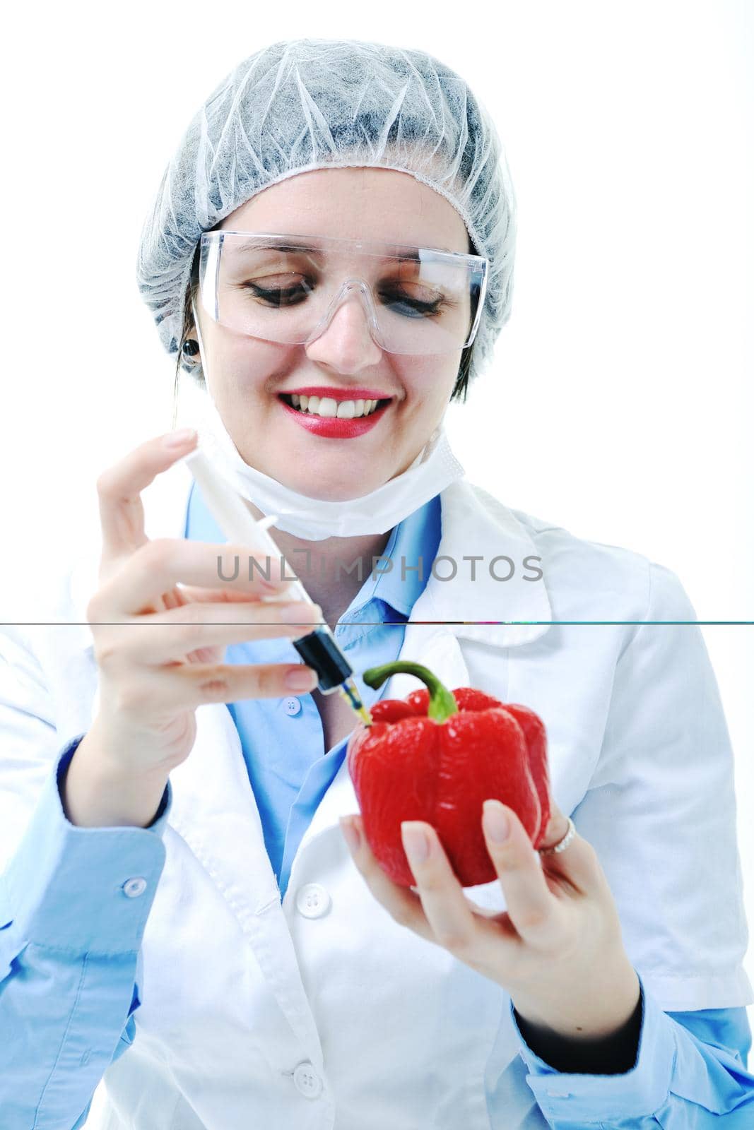 isolated on white young nurse doctor woman with red vegetable food papper representing bio food concept 