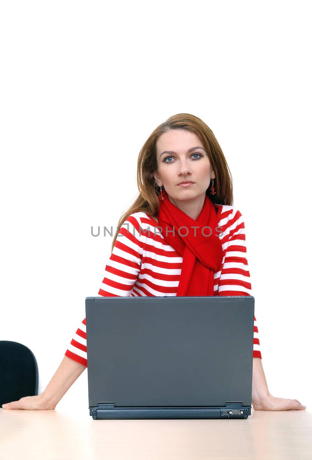 woman in red working on laptop at bright  office