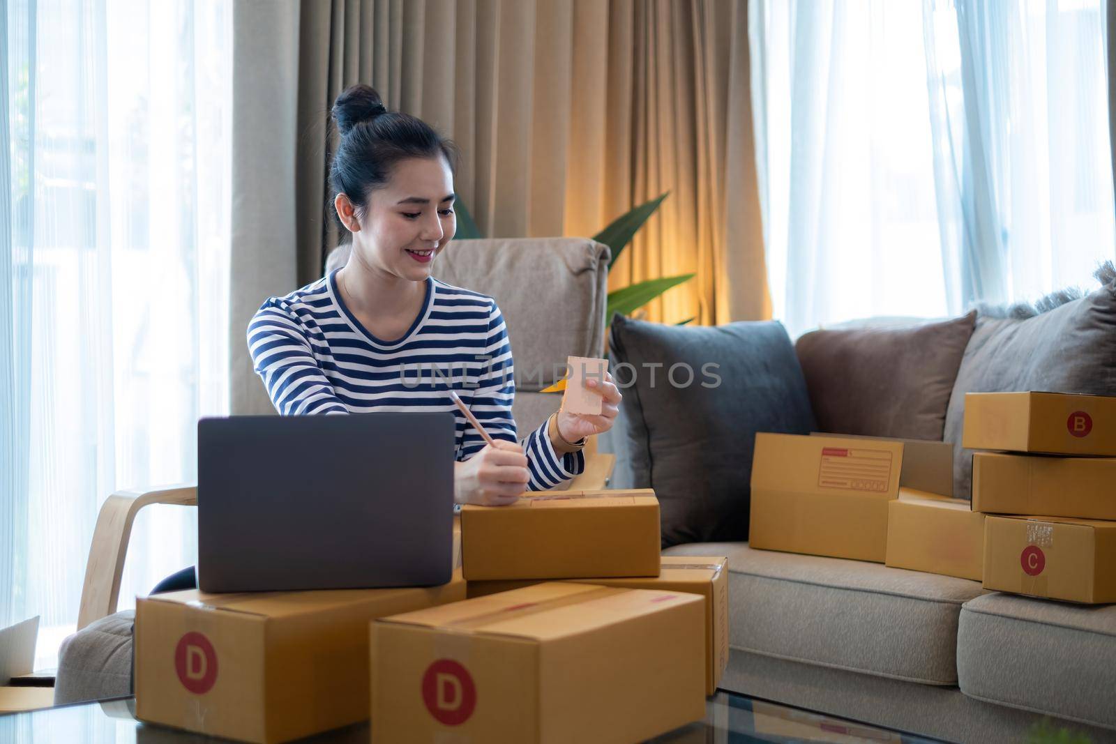 Asian small business owner working at home office. Business retail market and online sell marketing delivery, SME e-commerce concept. by itchaznong