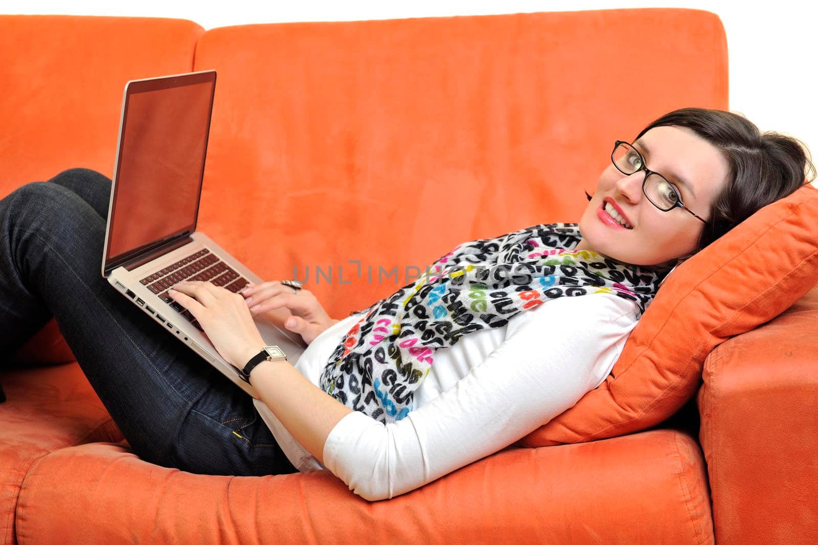 adult, beautiful, beauty, brunette, casual, caucasian, computer, couch, face, female, fun, girl, happy, home, house, indoor, indoors, interior, internet, keyboard, laptop, leisure, life, lifestyle, living, living room, modern, notebook, one, online, people, person, portrait, pretty, relax, room, smile, smiling, sofa, student, technology, typing, using, web, white, window, wireless, woman, work, young