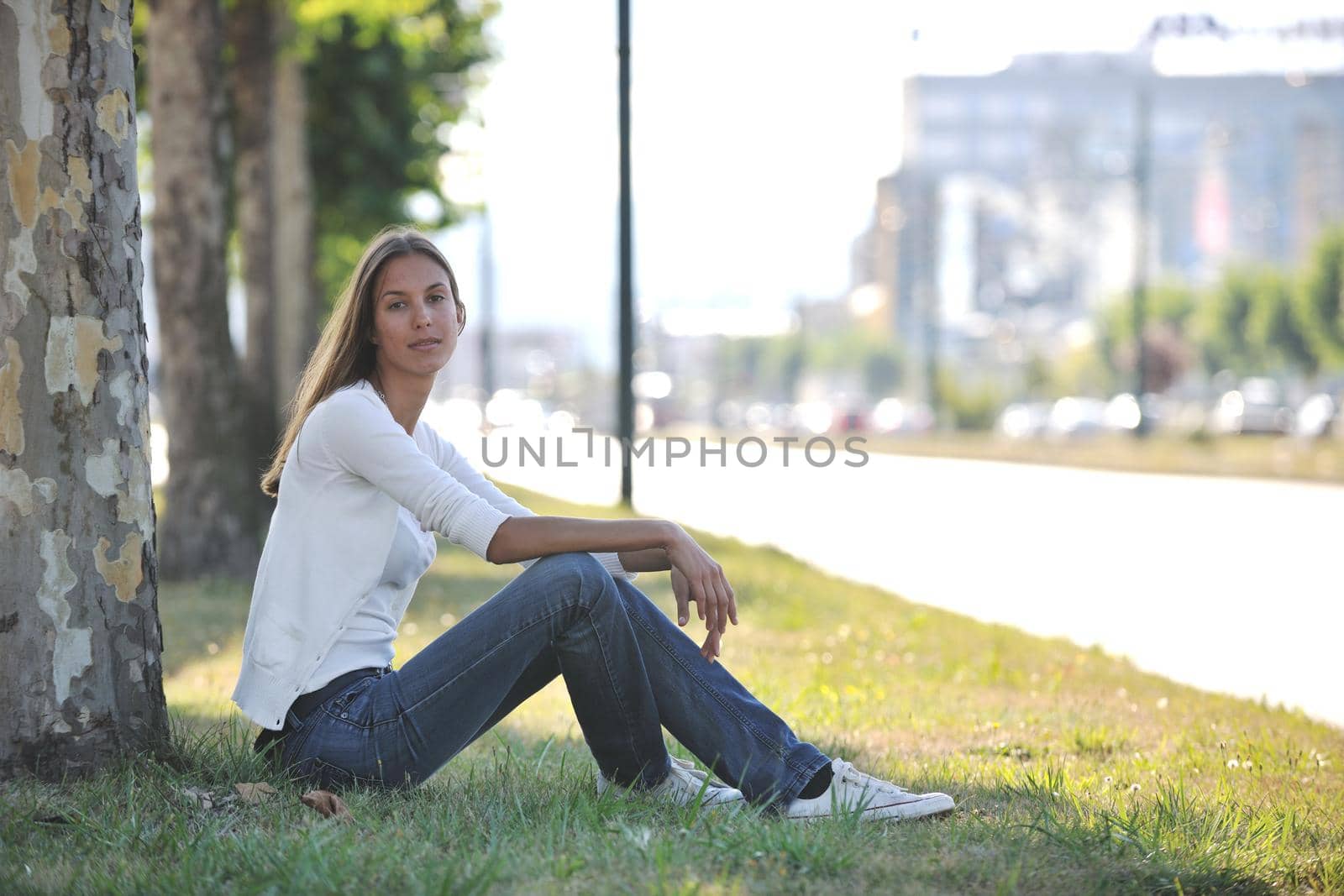 beautiful young woman have fun and relax at city street on beautiful sunny day