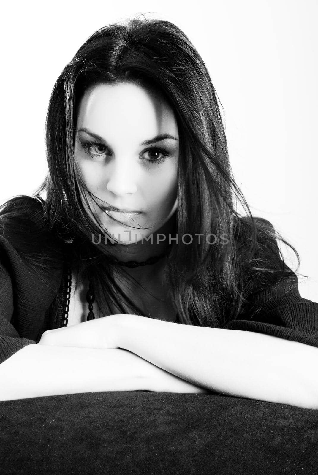 one brunette woman posing in studio 