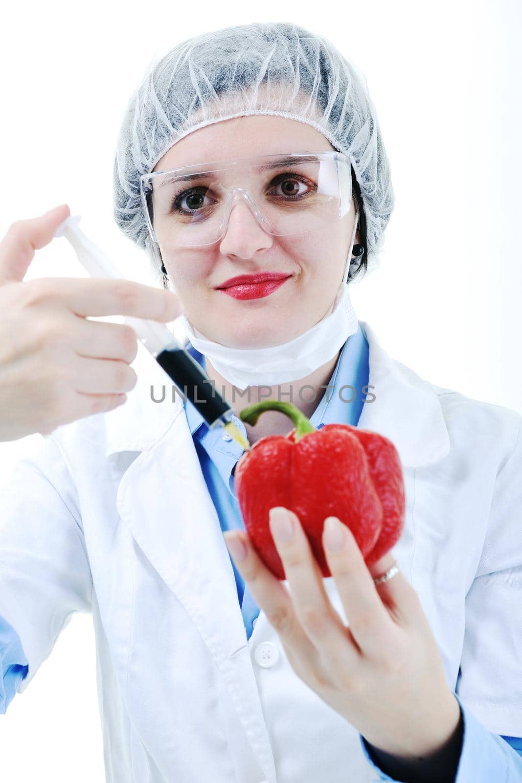 isolated on white young nurse doctor woman with red vegetable food papper representing bio food concept 