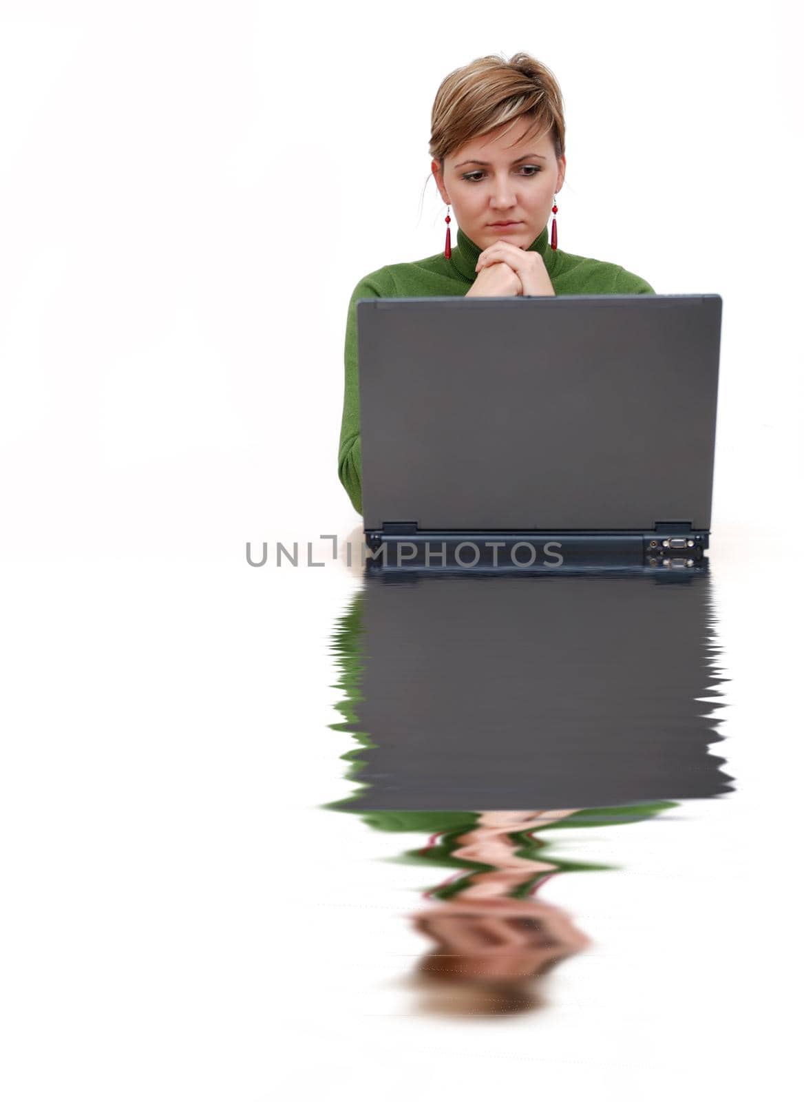 businesswoman in green with laptop