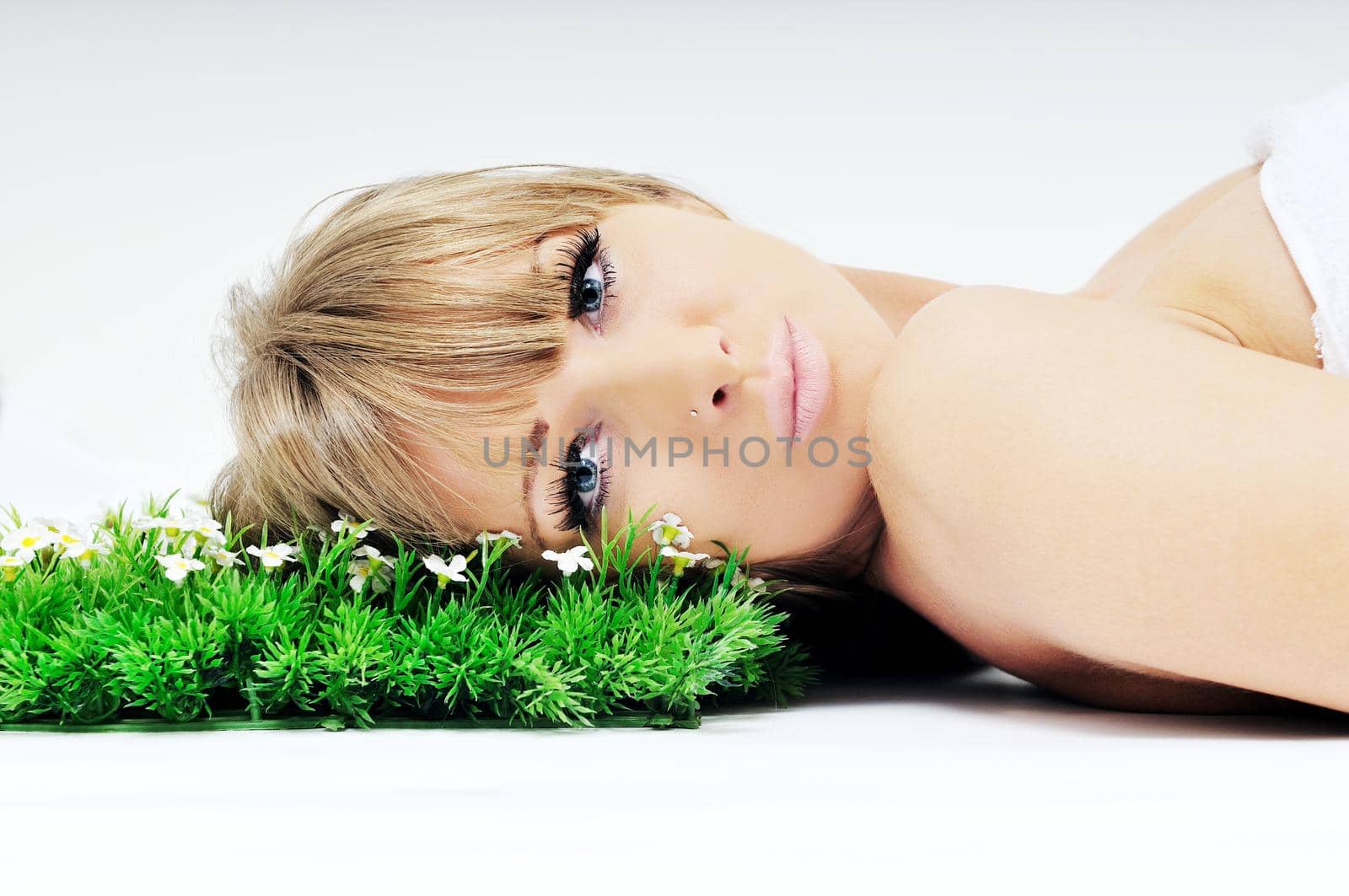 woman face on grass  by dotshock