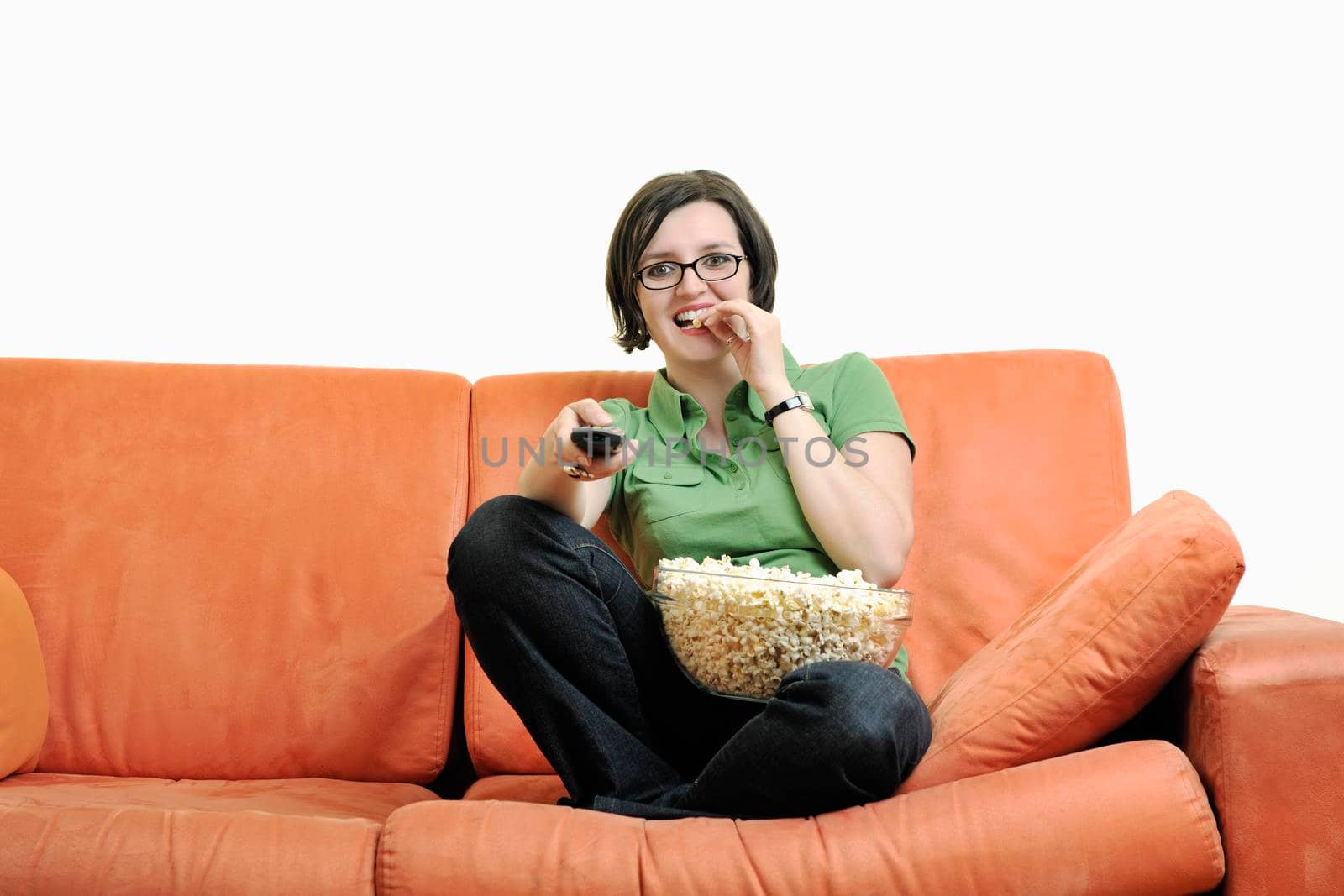 young woman eat popcorn, watching movies and eat popcor isolated on white