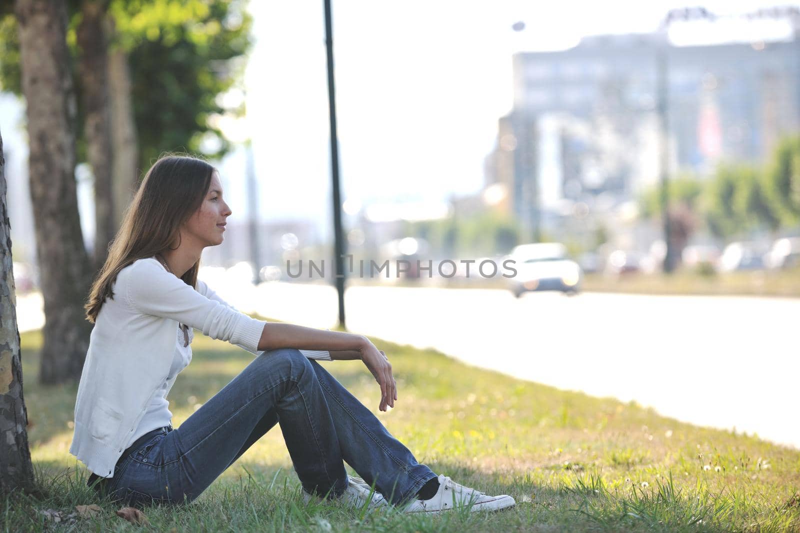 beautiful young woman have fun and relax at city street on beautiful sunny day