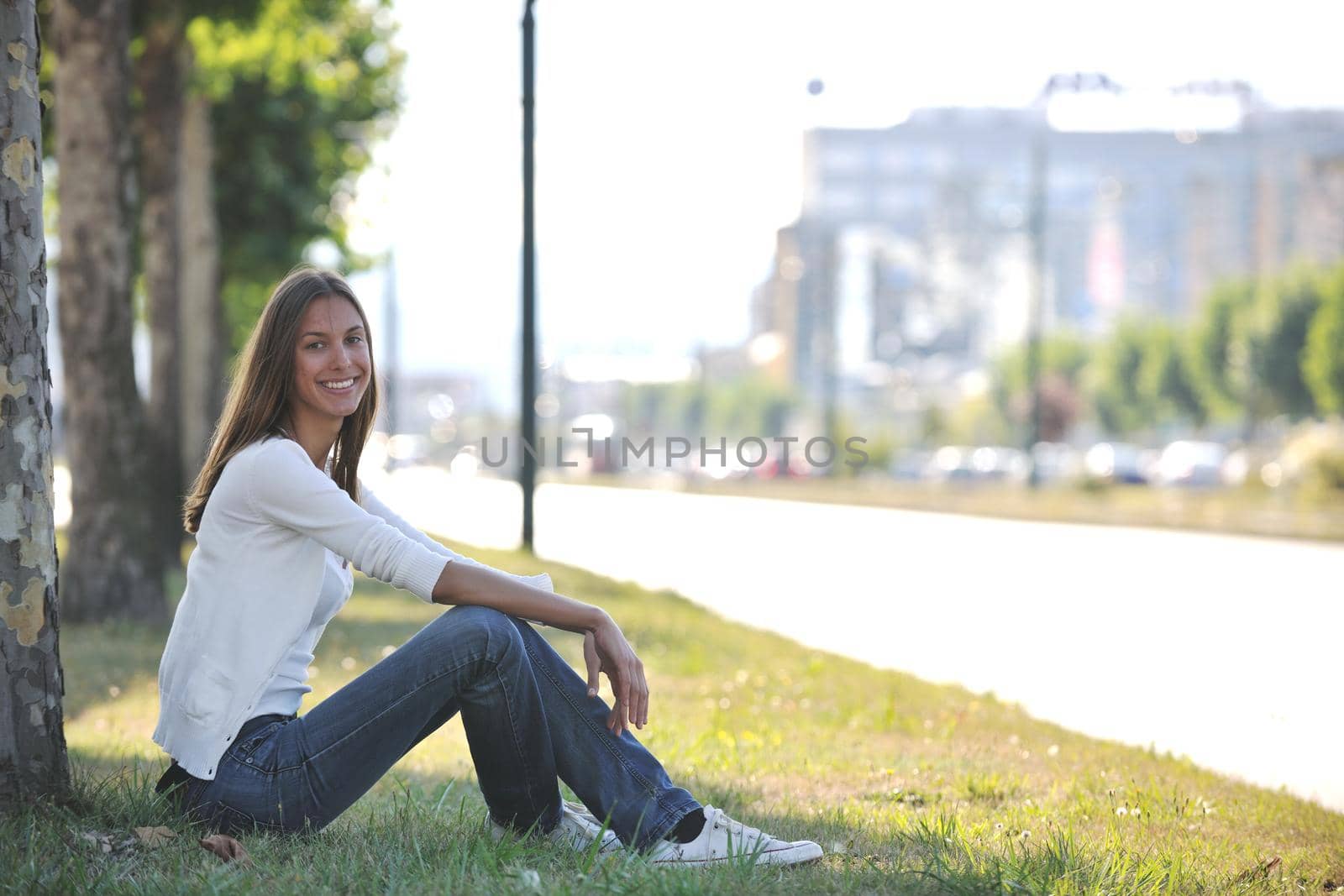 beautiful young woman have fun and relax at city street on beautiful sunny day