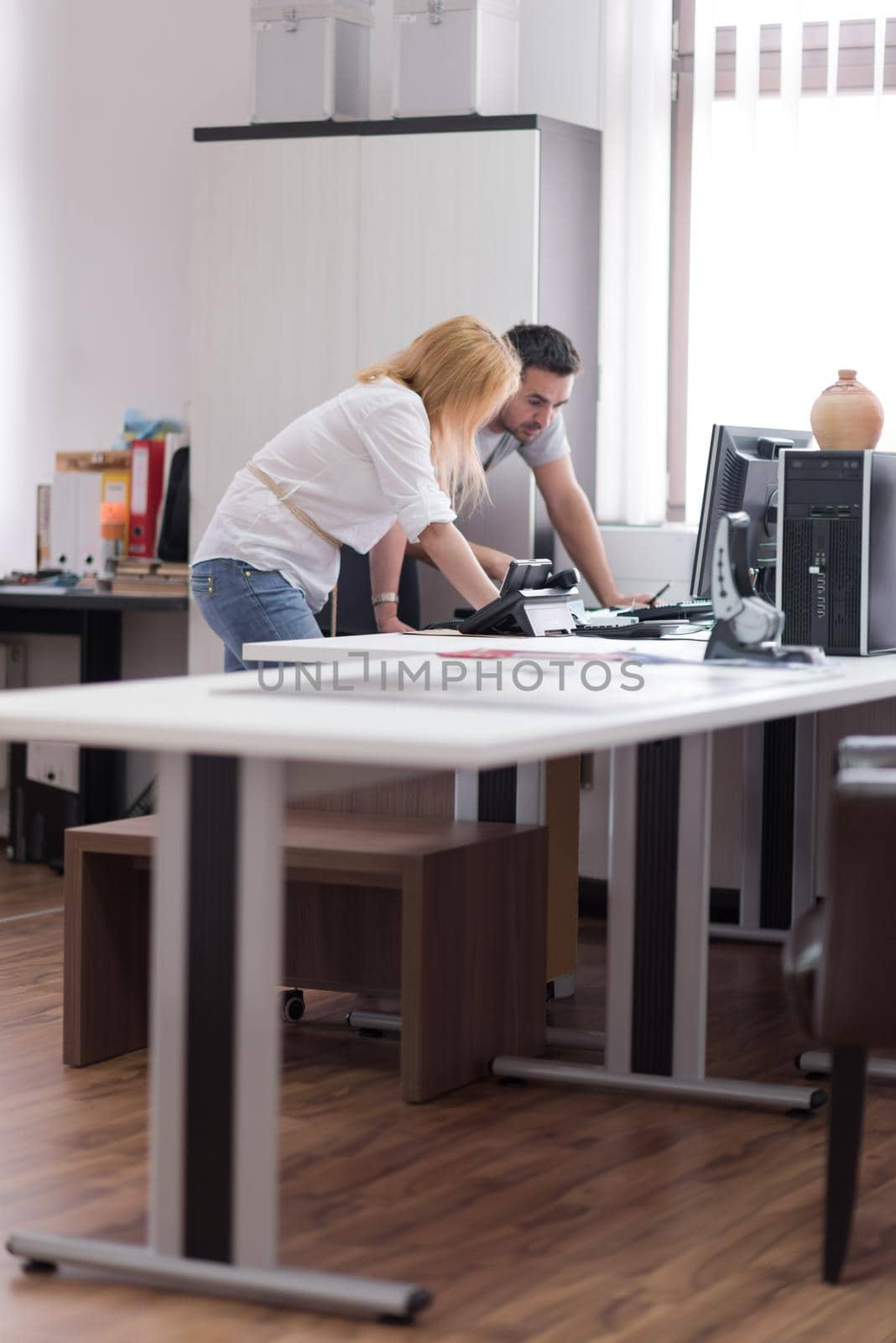 designers in office at the wooden furniture manufacture by dotshock