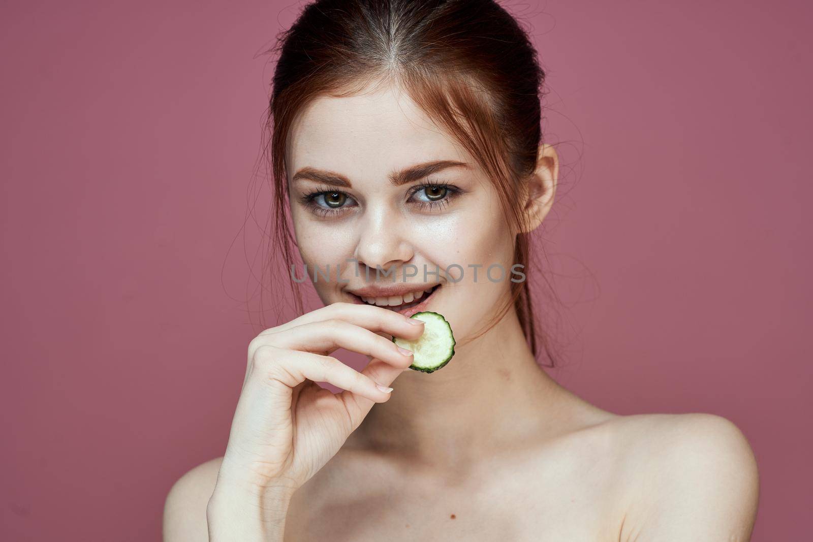 cheerful woman cucumbers vitamins clean skin health by Vichizh