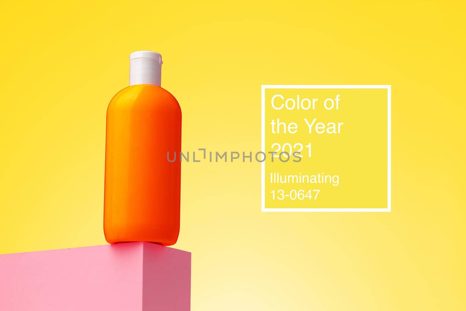 Skincare beauty product container against Illuminating yellow background , color of year 2021