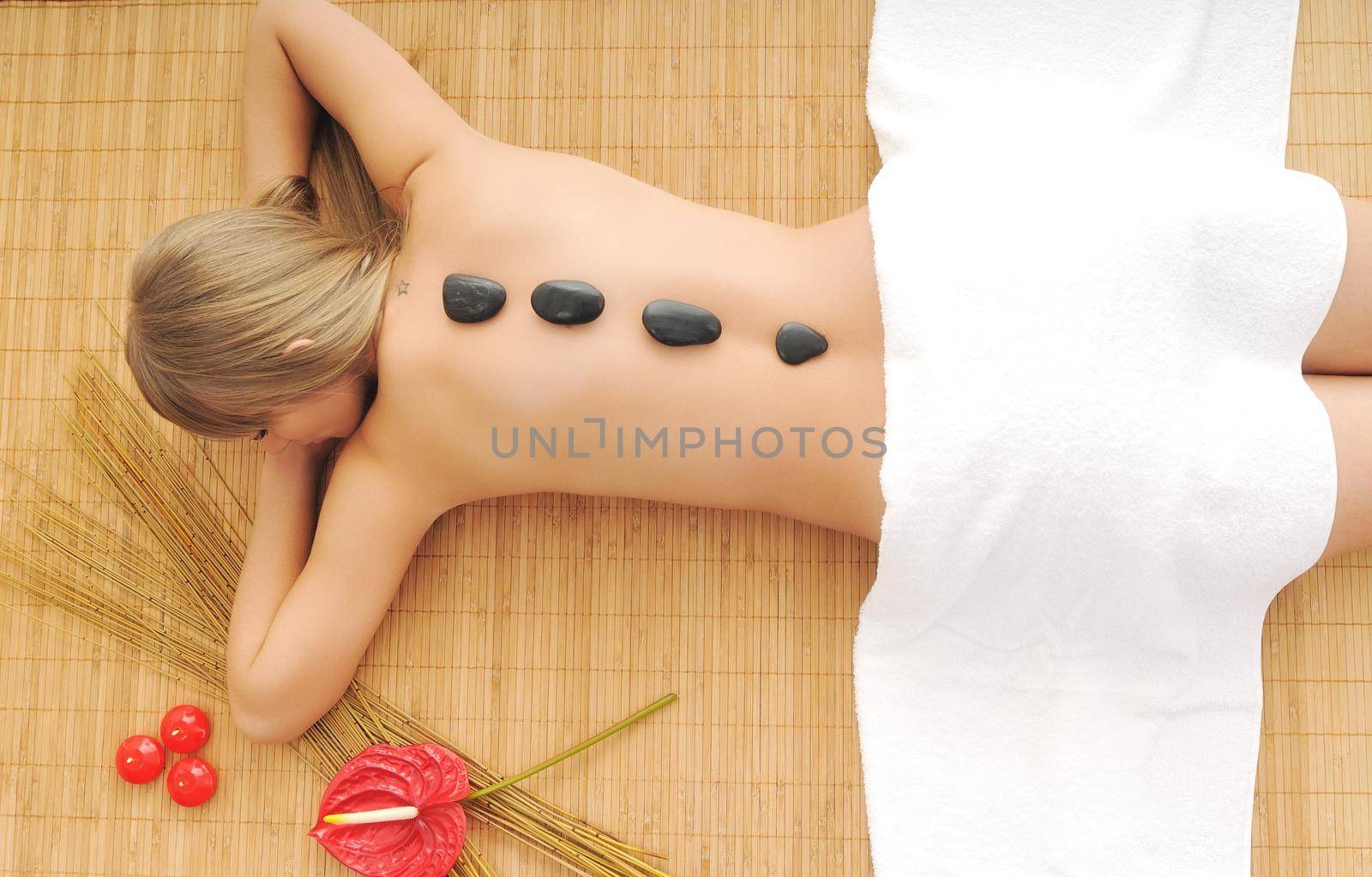 Massage with hot volcanic stones by dotshock