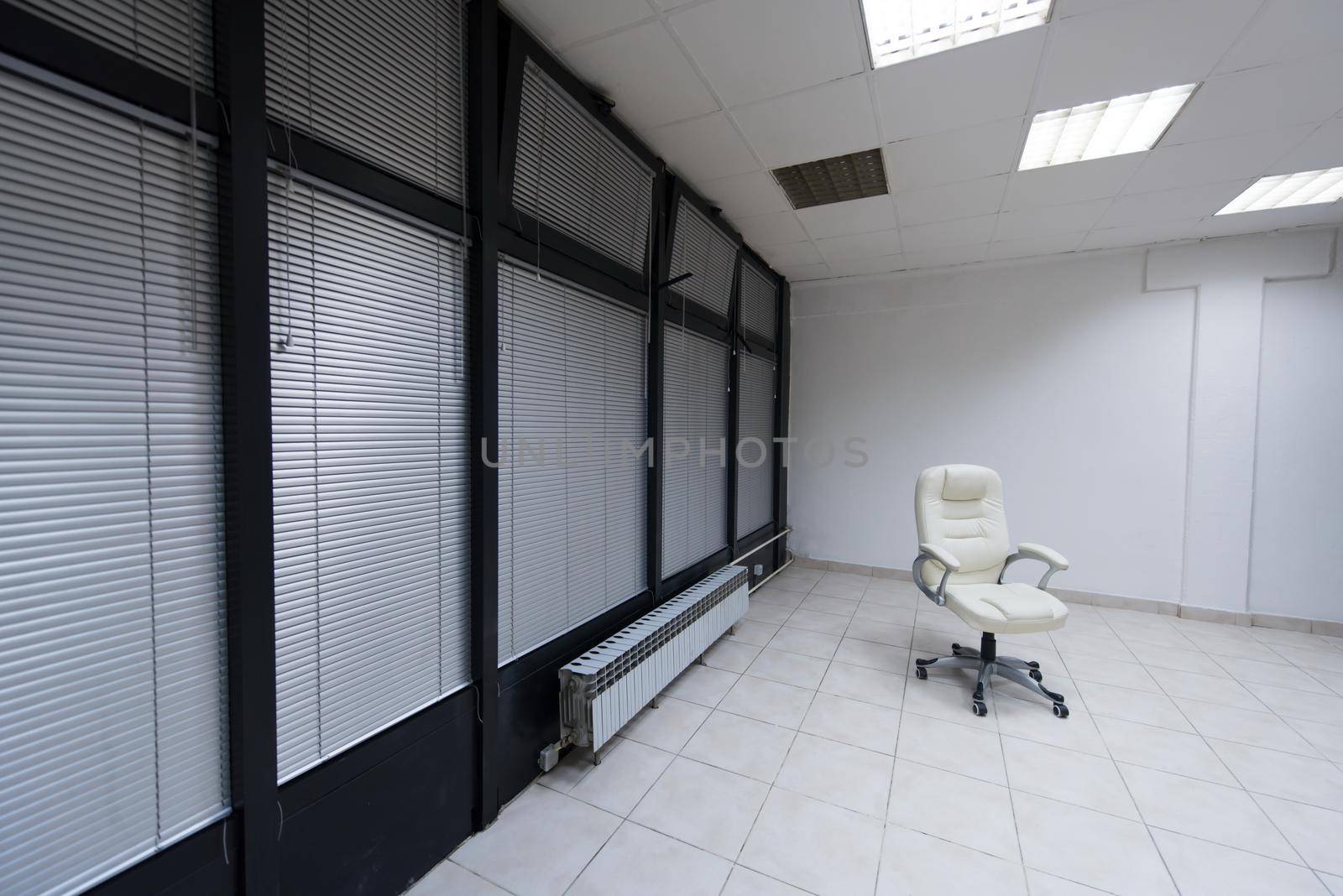 modern white office chair furiniture in empty startup business space