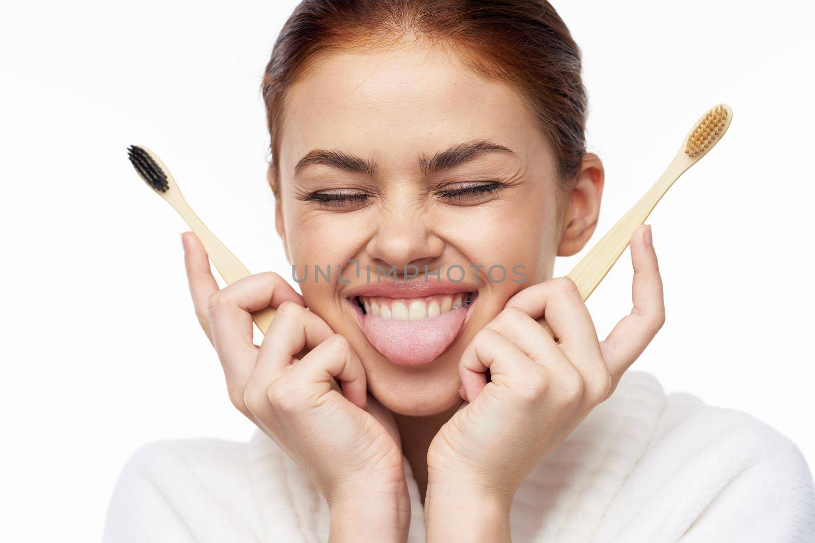 cheerful woman in white coat toothbrush dental health hygiene by Vichizh