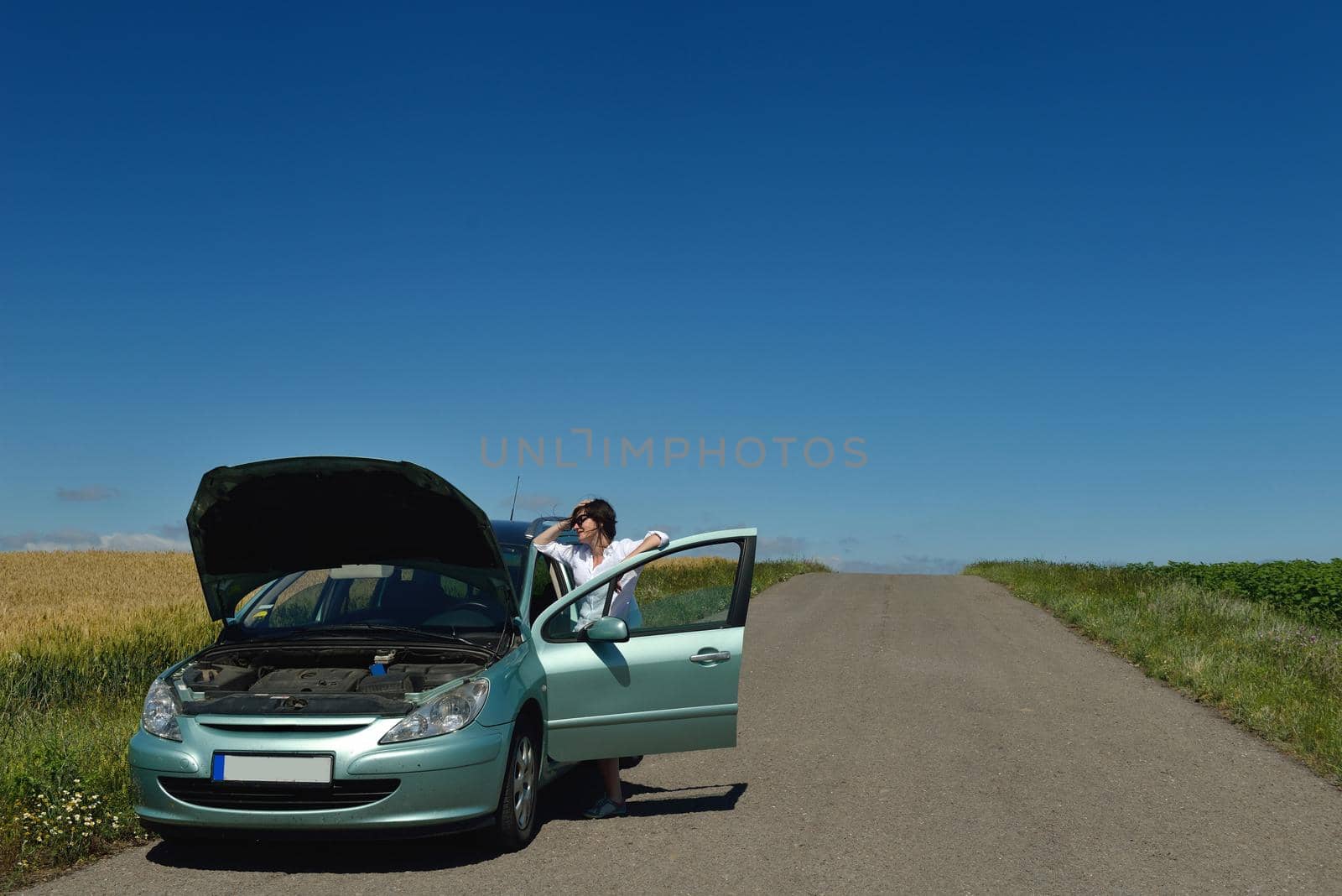 woman with broken car by dotshock