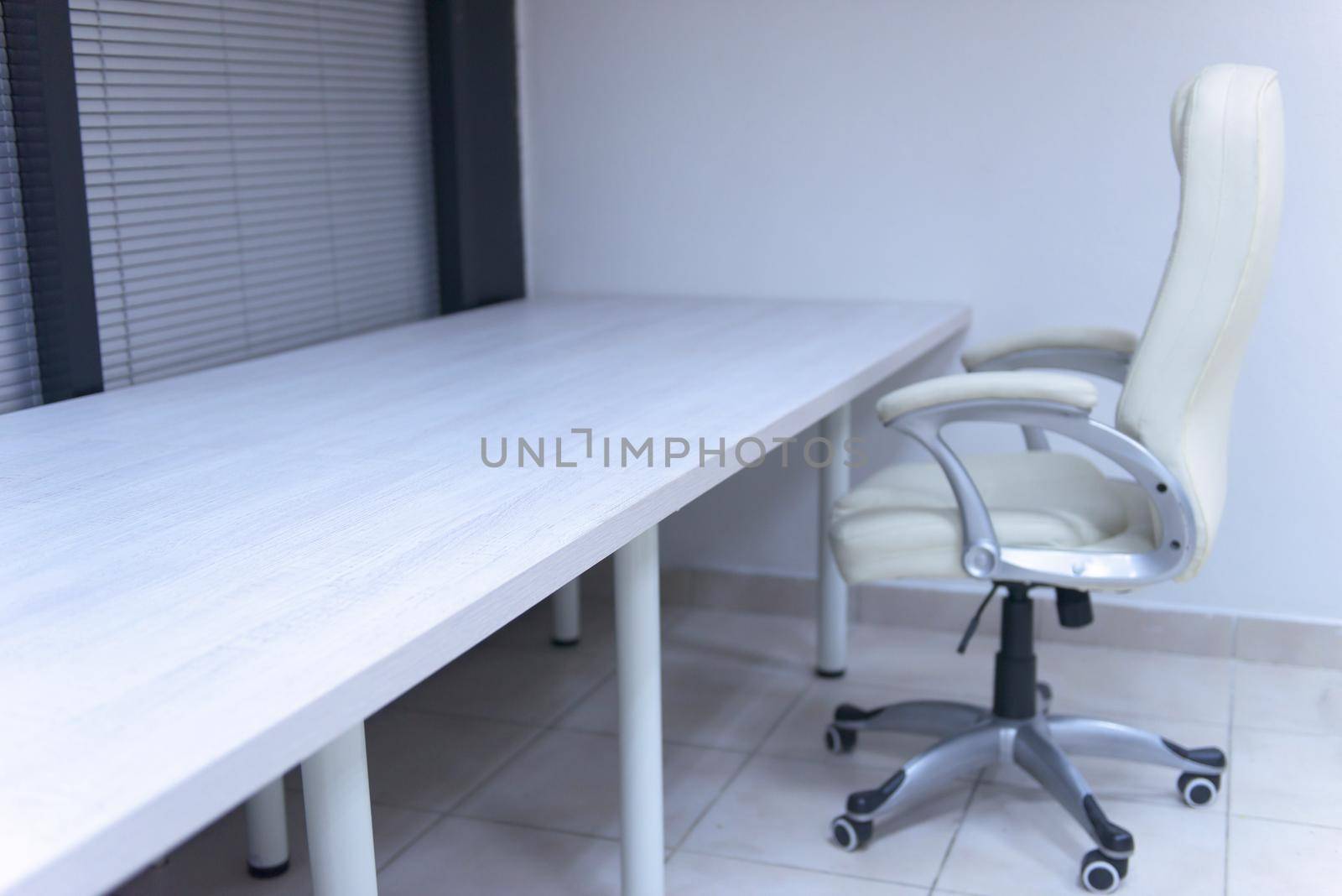 modern white office chair furiniture in empty startup business space