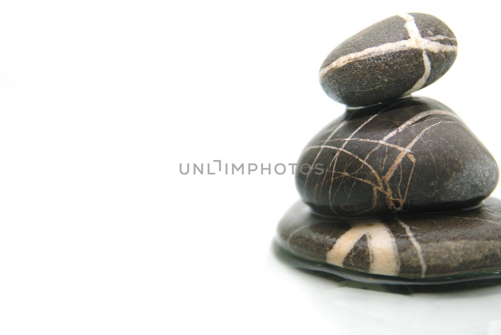 .zen stones with reflection isolated by dotshock