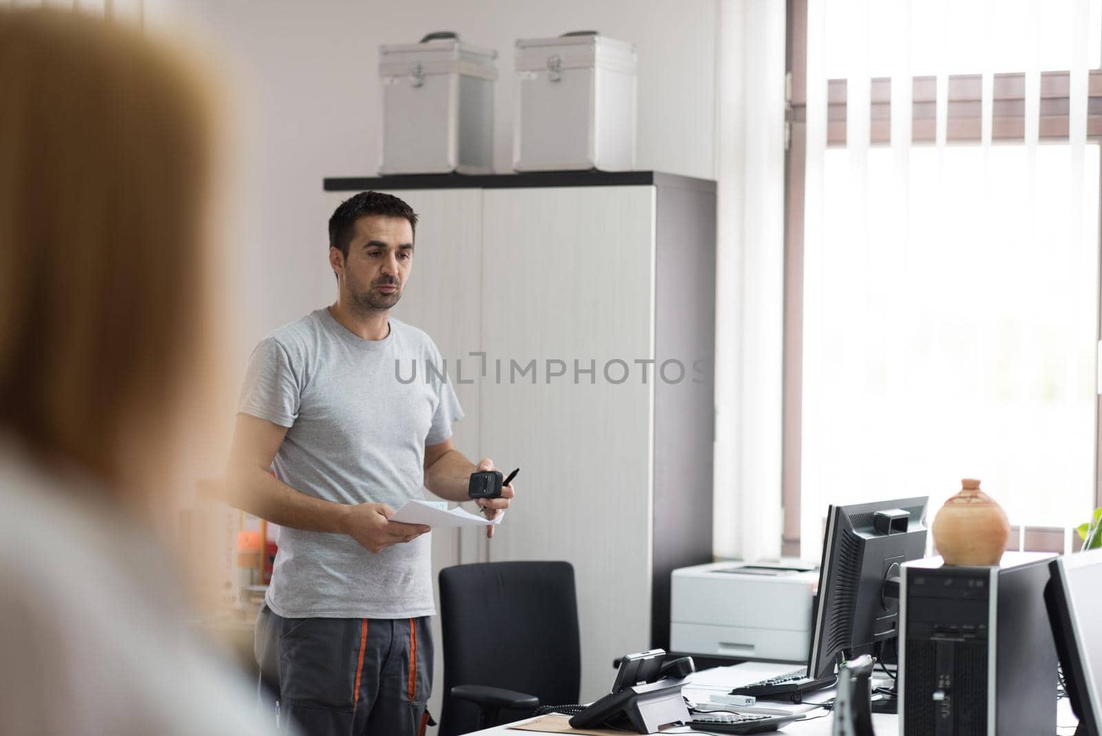 designers in office at the wooden furniture manufacture by dotshock