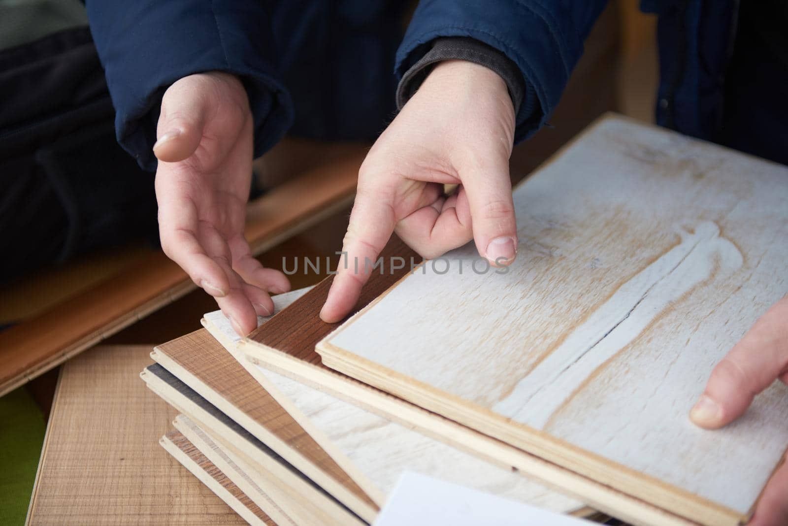 wood floor parquet shop selecting variants hands closeup