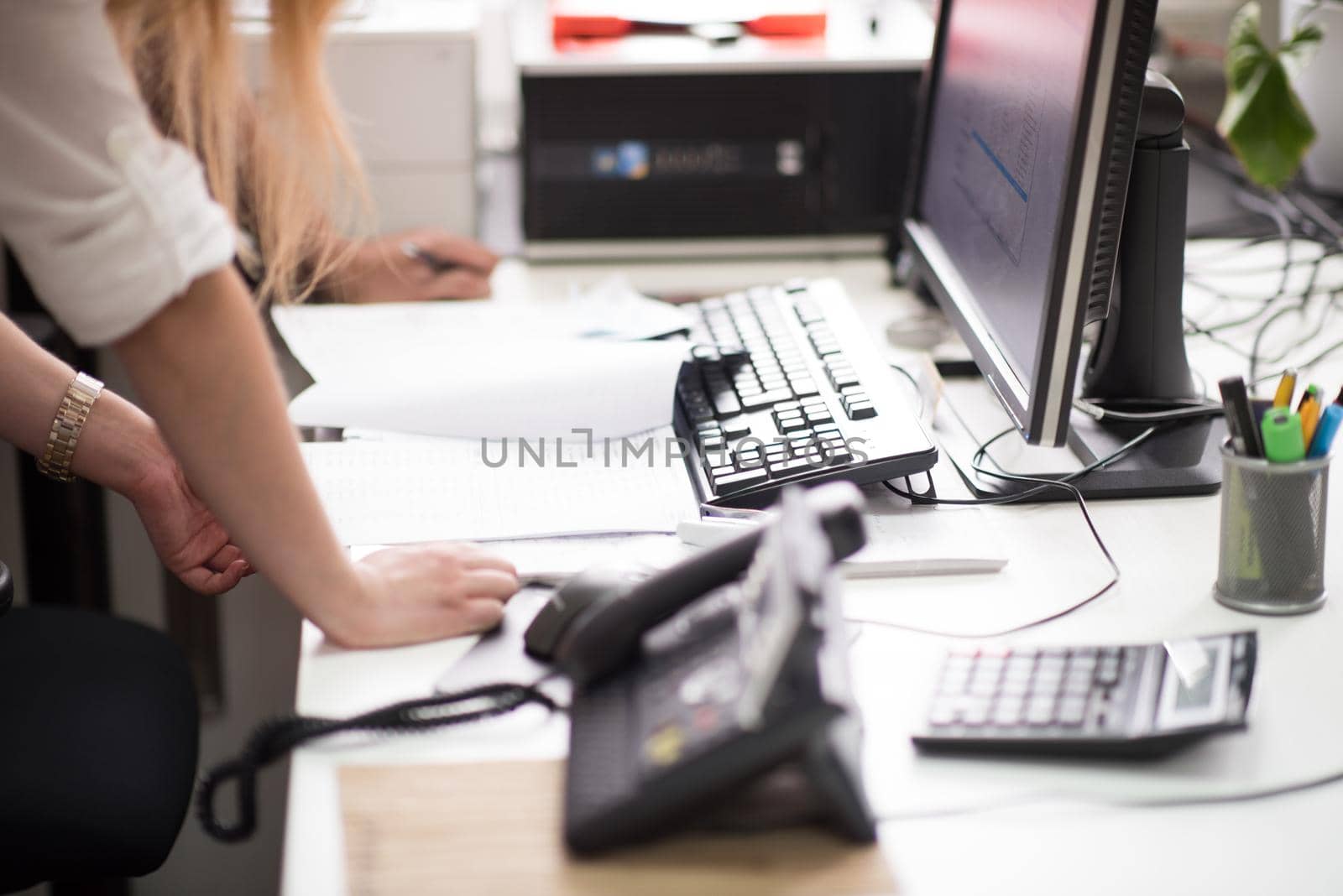 designers in office at the wooden furniture manufacture by dotshock