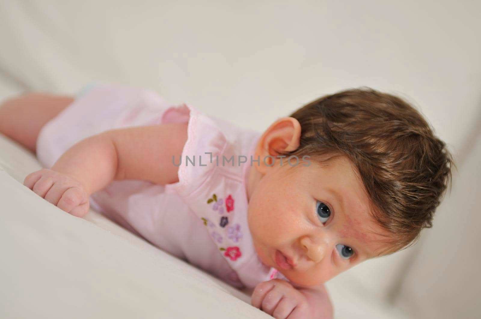 cute little baby indoor closeup portrait