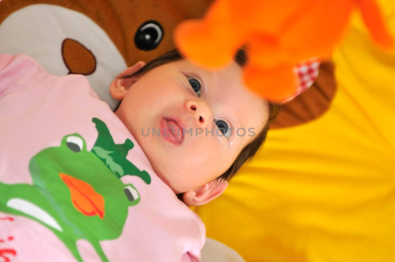 indoor portrait with happy young famil and  cute little babby 