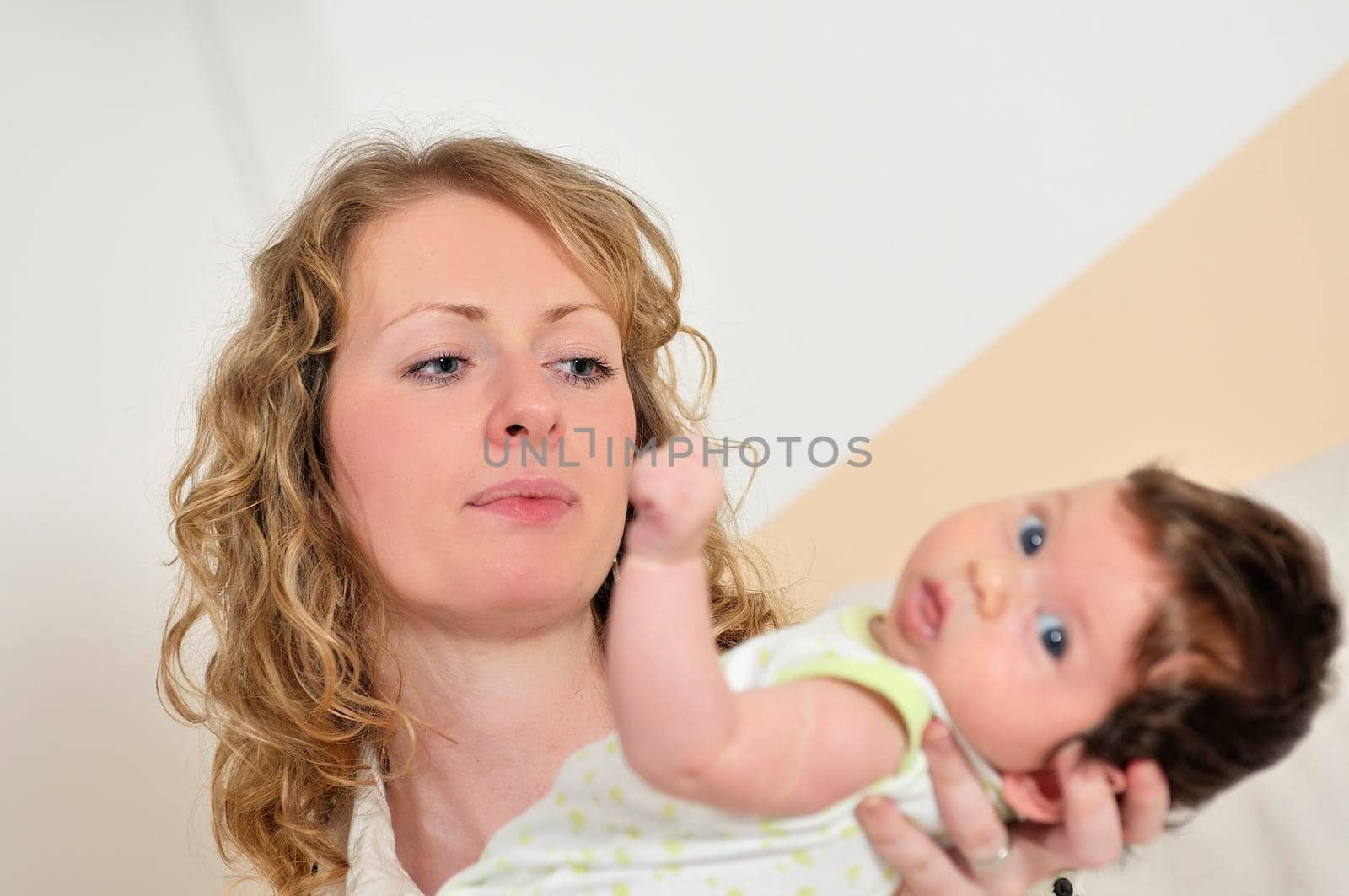 beautiful young mother small with little baby by dotshock