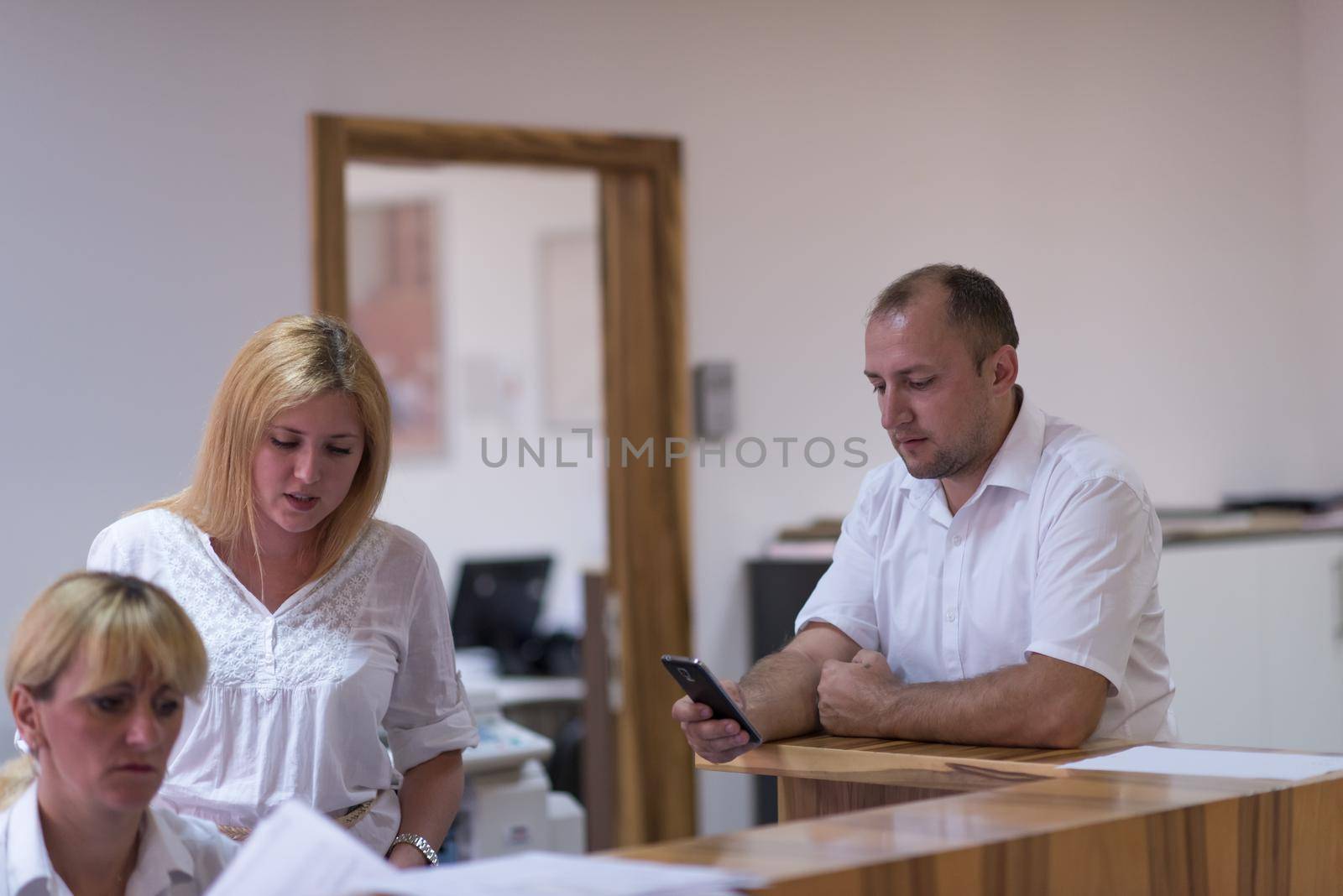 designers in office at the wooden furniture manufacture by dotshock