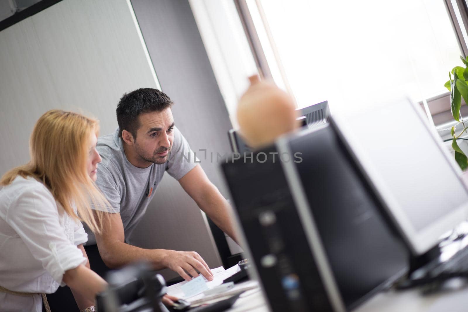 designers in office at the wooden furniture manufacture by dotshock