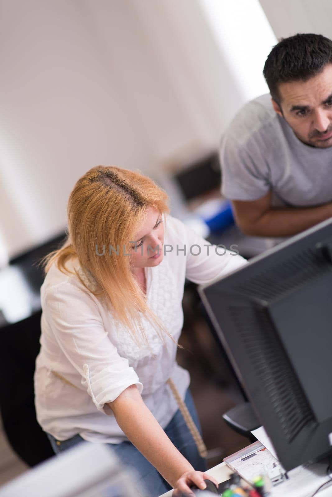 designers in office at the wooden furniture manufacture by dotshock