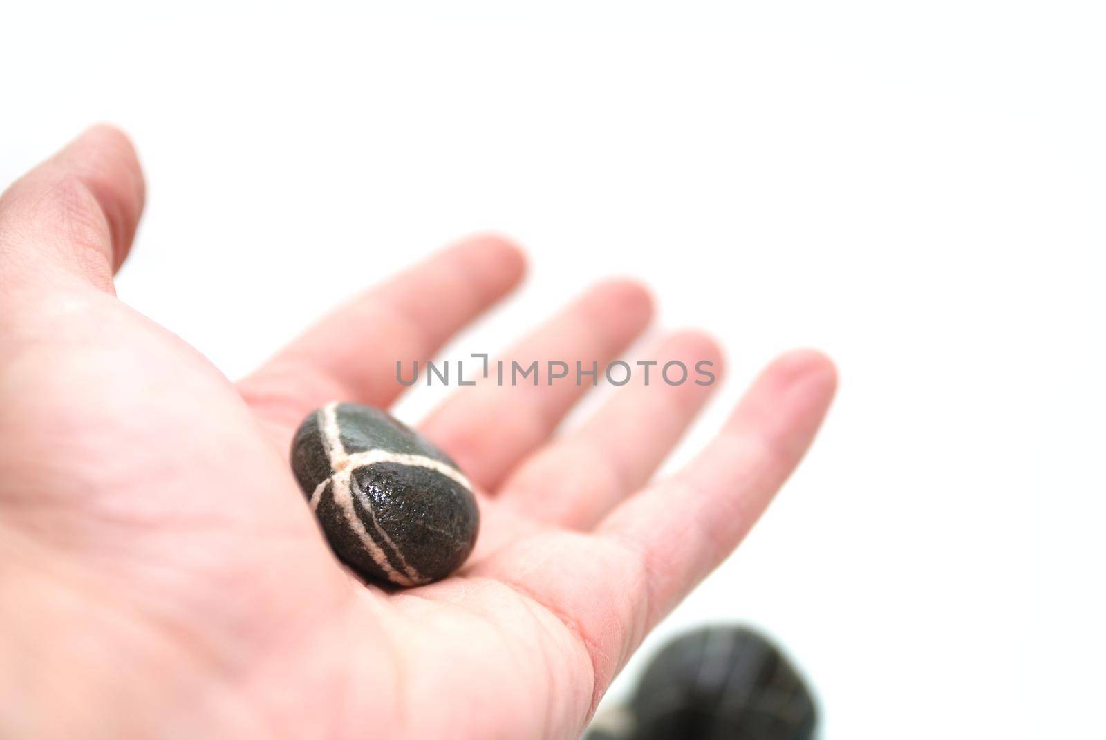 .zen stones in palm  by dotshock