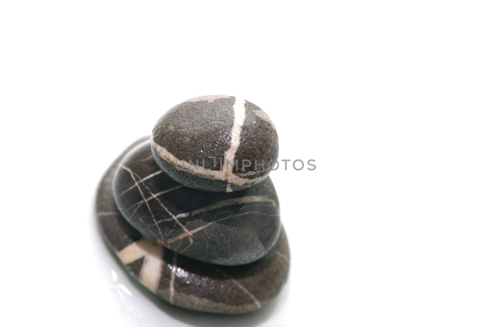 .zen stones with reflection isolated by dotshock