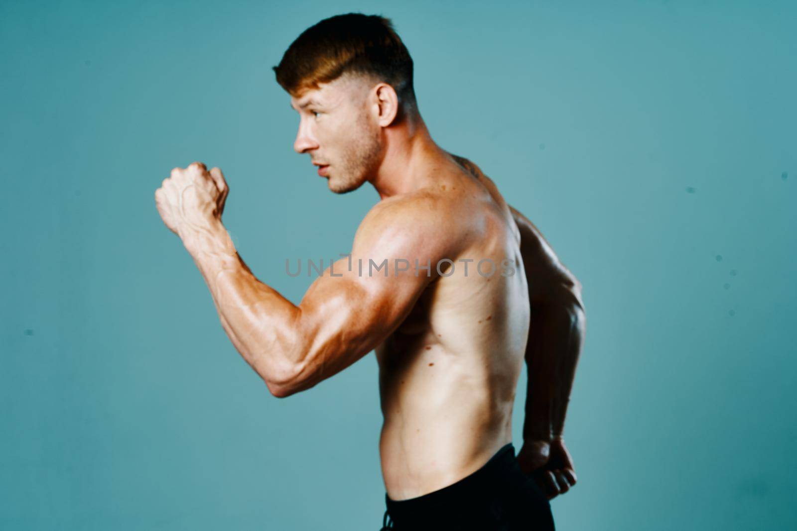 male athlete workout fitness muscle posing exercise. High quality photo