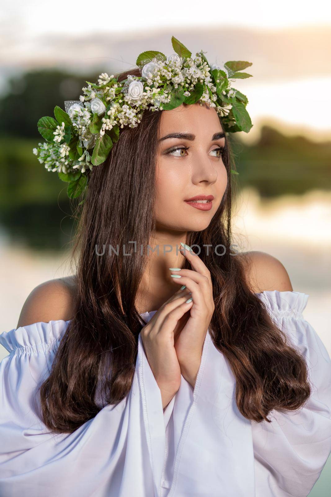 Woman in white dress in the water. Art Woman with wreath on her head in river. Wreath on her head, Slavic traditions and paganism by nazarovsergey