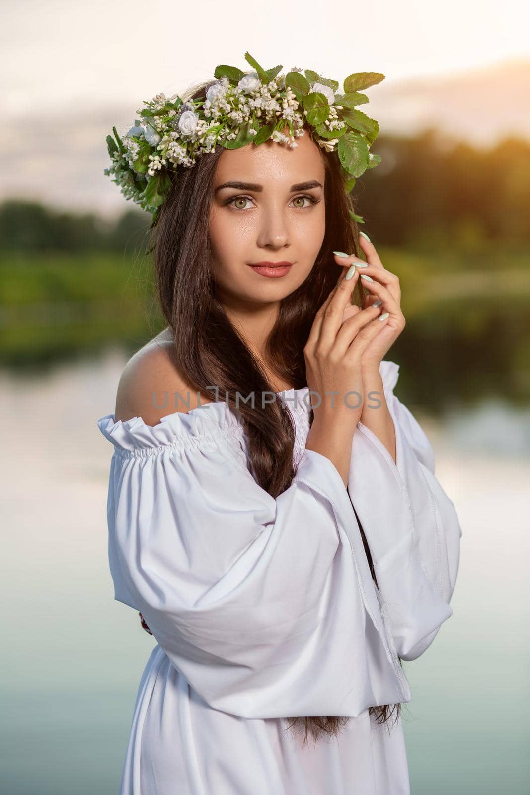 Woman in white dress in the water. Art Woman with wreath on her head in river. Wreath on her head, Slavic traditions and paganism by nazarovsergey