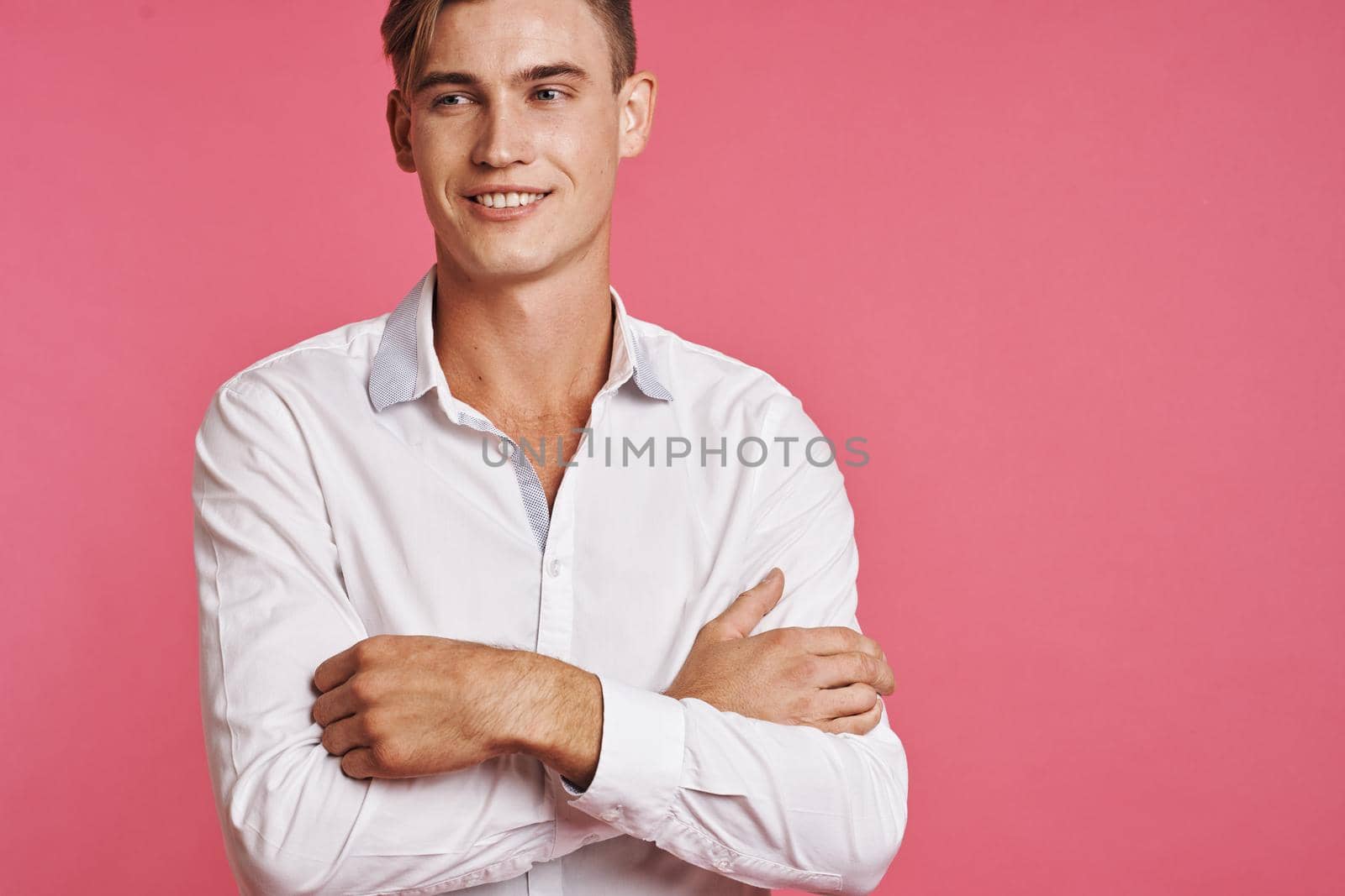 businessmen posing white shirt fashion self confidence pink background. High quality photo