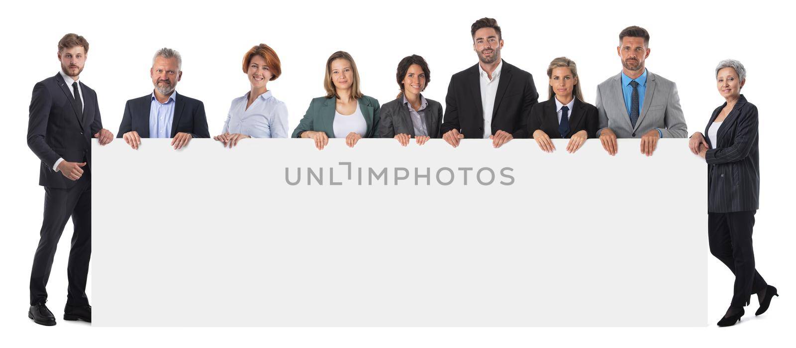 Business people with blank banner by ALotOfPeople